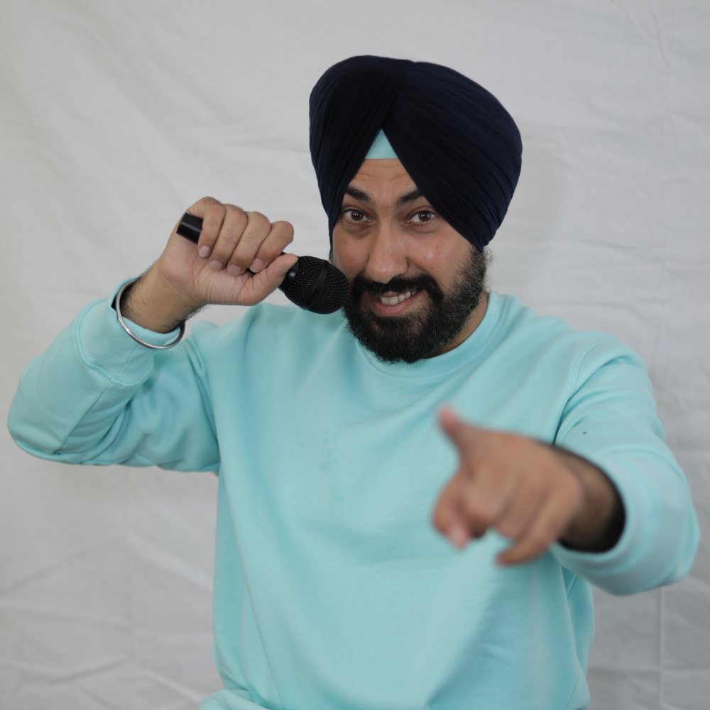 Harmeet Singh Kohli doing crowd work during a live comedy show